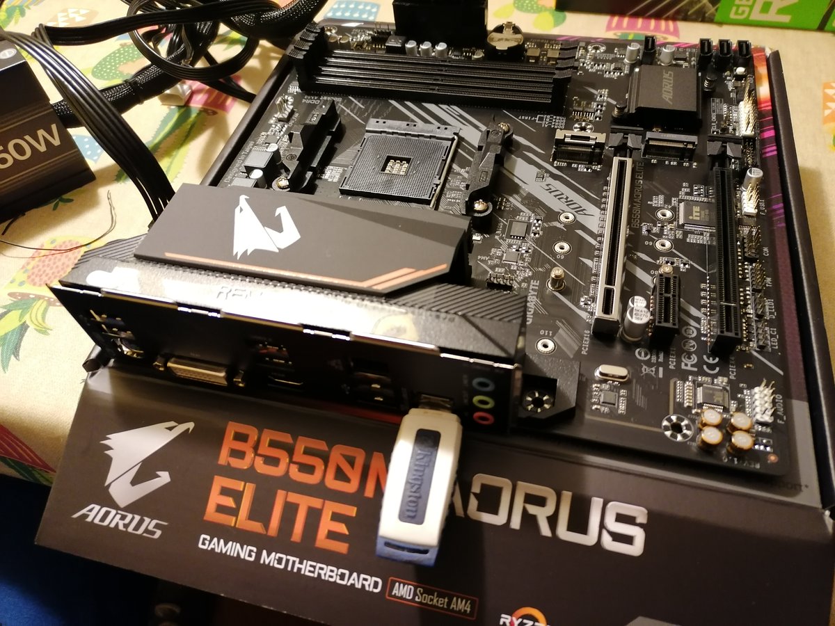 Step 2: update the BIOS to support Ryzen 5000 series (Vermeer) using a USB stick and Gigabyte Q_FLASH capability.