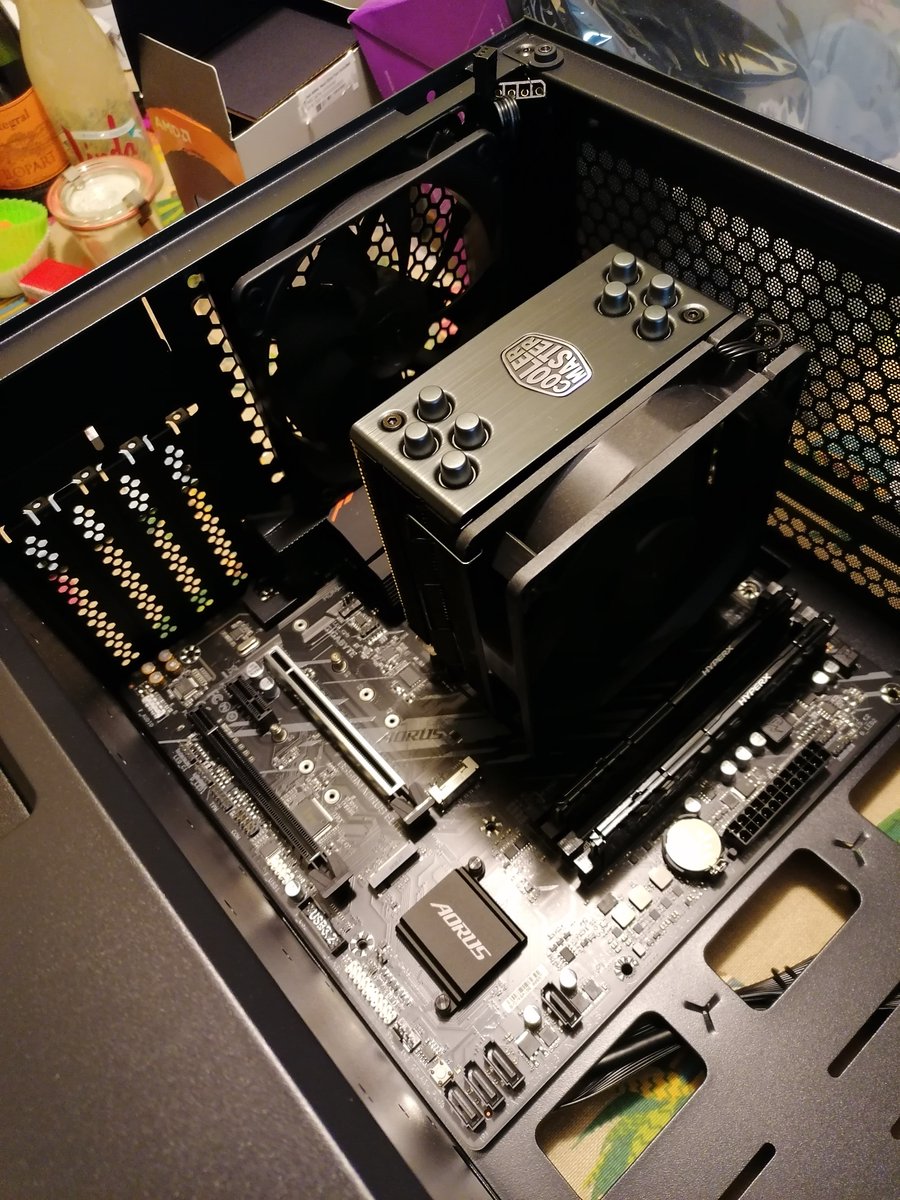 Step 8: Insert the motherboard into the case. Fasten the screws.