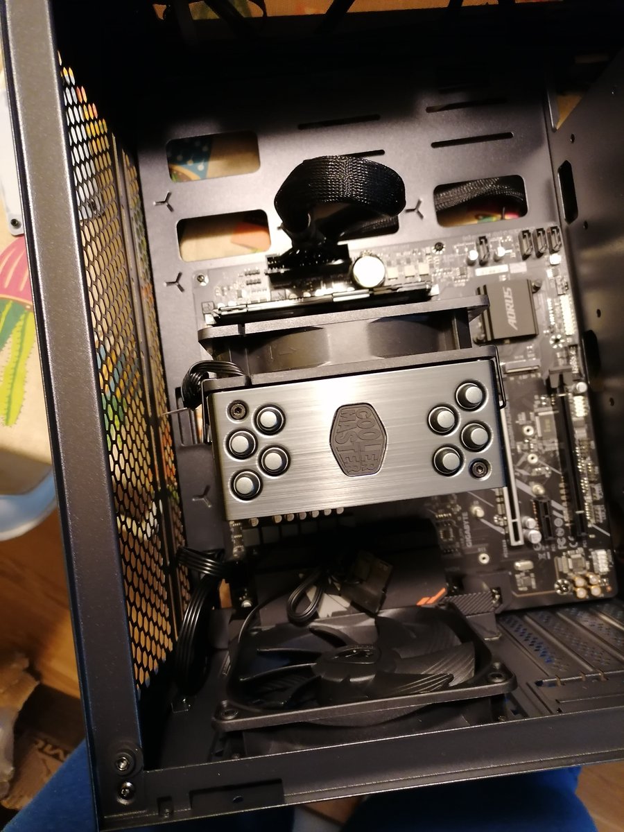 Step 9: Connect motherboard power cables (1 wide and 1 smaller). The smaller one took a lot of finger twisting. I should have connected them prior to fastening the board to the case.