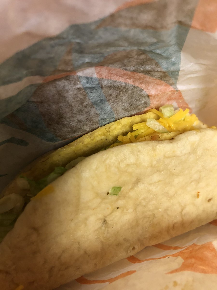 TaylorHanberry's tweet photo. Thanks @tacobell for my cheesy Gordita crunch with a side of #covid from your North Charleston location. Such poor service! Better take a look before someone else gets this disgusting hair in their food! It’s not mine either. 

#sogross #hairinmyfood #COVID19 #tacobell #infected https://t.co/uyBzMT1x4R