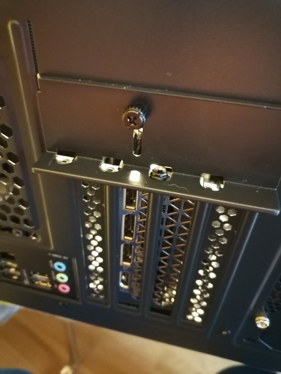 Step 10: Remove 2 expansion bay lids and install RTX 3060Ti graphics card into the PCIe slot. Also, connect the PCIe power to the card.