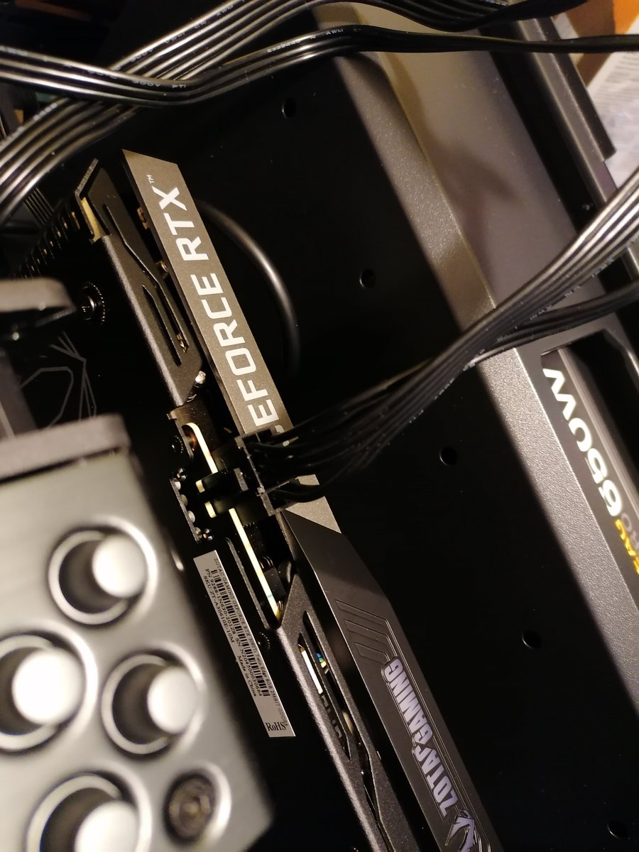 Step 10: Remove 2 expansion bay lids and install RTX 3060Ti graphics card into the PCIe slot. Also, connect the PCIe power to the card.