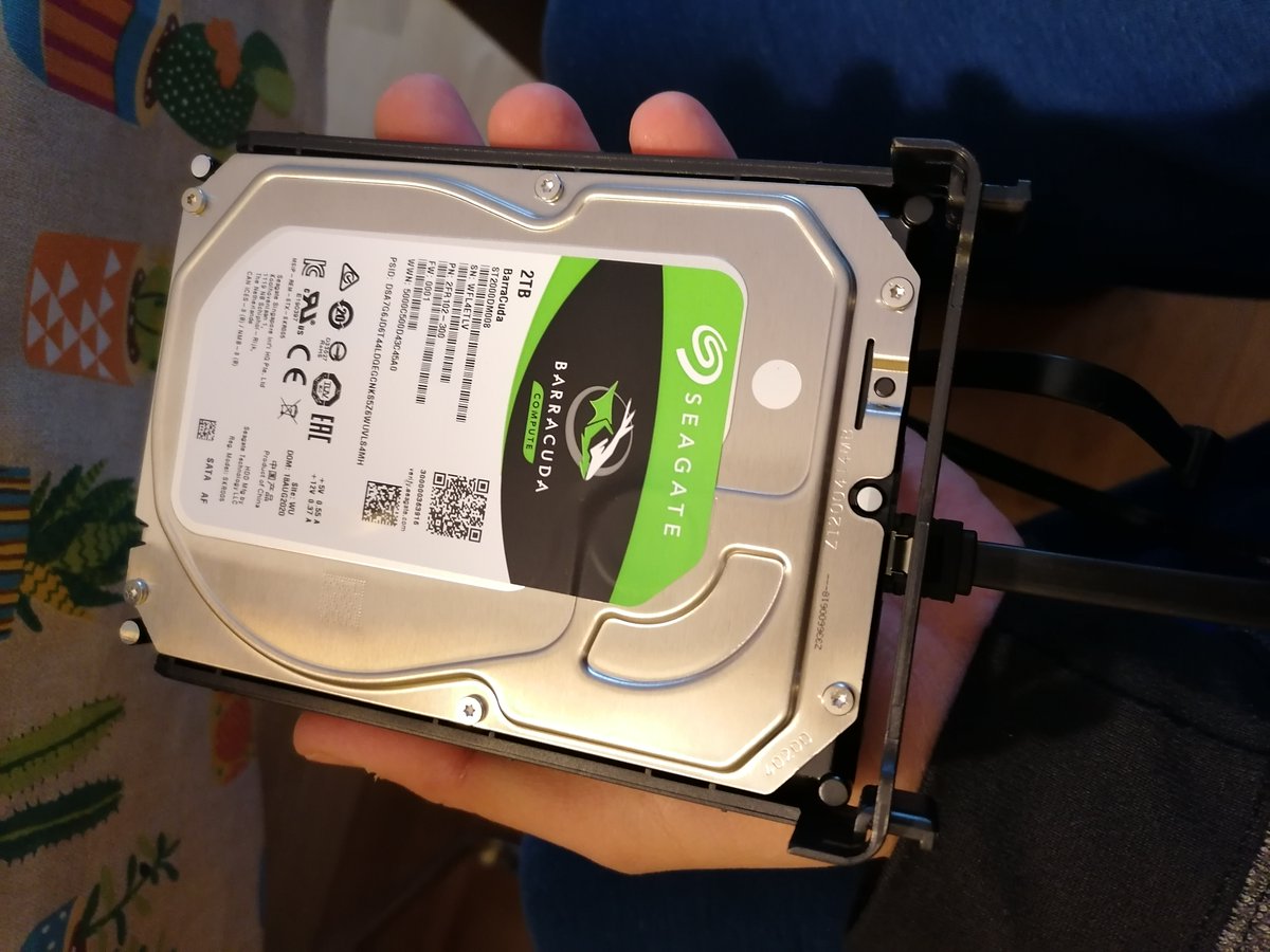 Step 11: Install SATA HDD in its bay (it took me a while to find how). Connect the SATA cable to the board. (I forgot to connect the SATA power cable , I did it when everything was assembled)