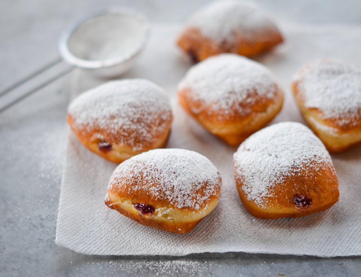 sufganiyot- a mix between a beignet and a jelly filled doughnut. it’s eaten during hannukah when fried foods are traditional.
