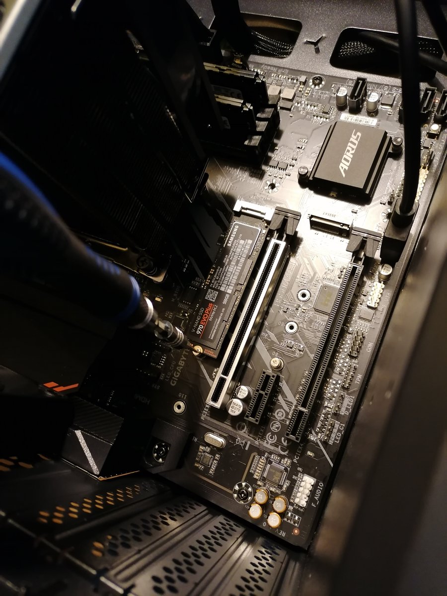 Step 9: Insert M.2 SSD into its slot and fasten the supporting screw. This particular M.2 slot is directly connected to the CPU in my motherboard.