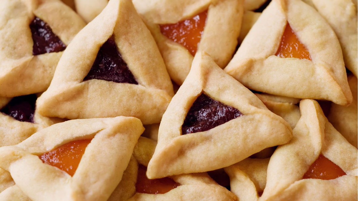 hamantaschen- a petty cookie meant to resemble the ears/hat of haman a man who tried to kill all the Jews. it has fruit or chocolate fillings and is eaten on purim.
