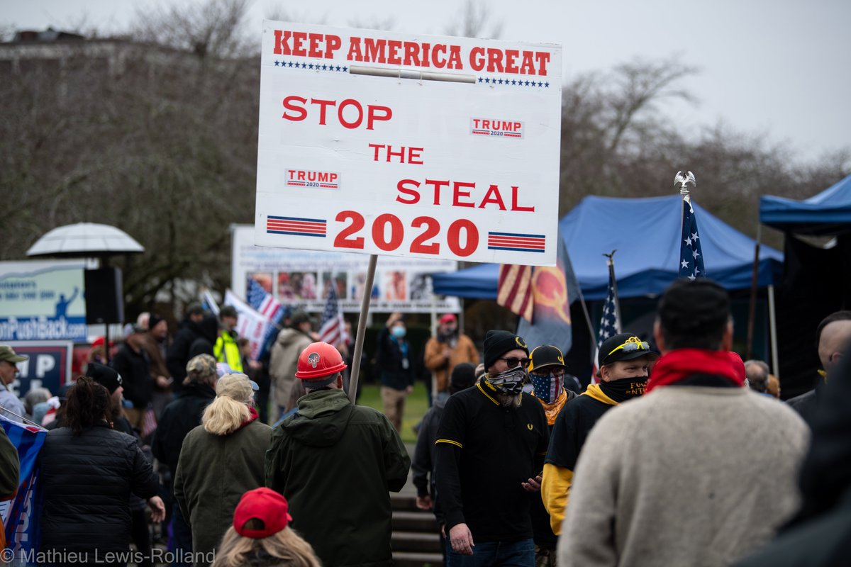 (2) Trump Loyalists gather outside of the Capitol Building in Salem, OR.