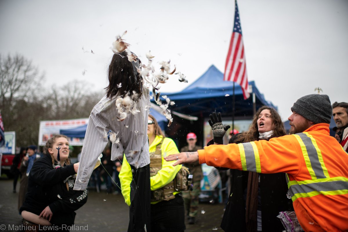 (3) An effigy of Oregon Governor Kate Brown is tarred, feathered and set ablaze.