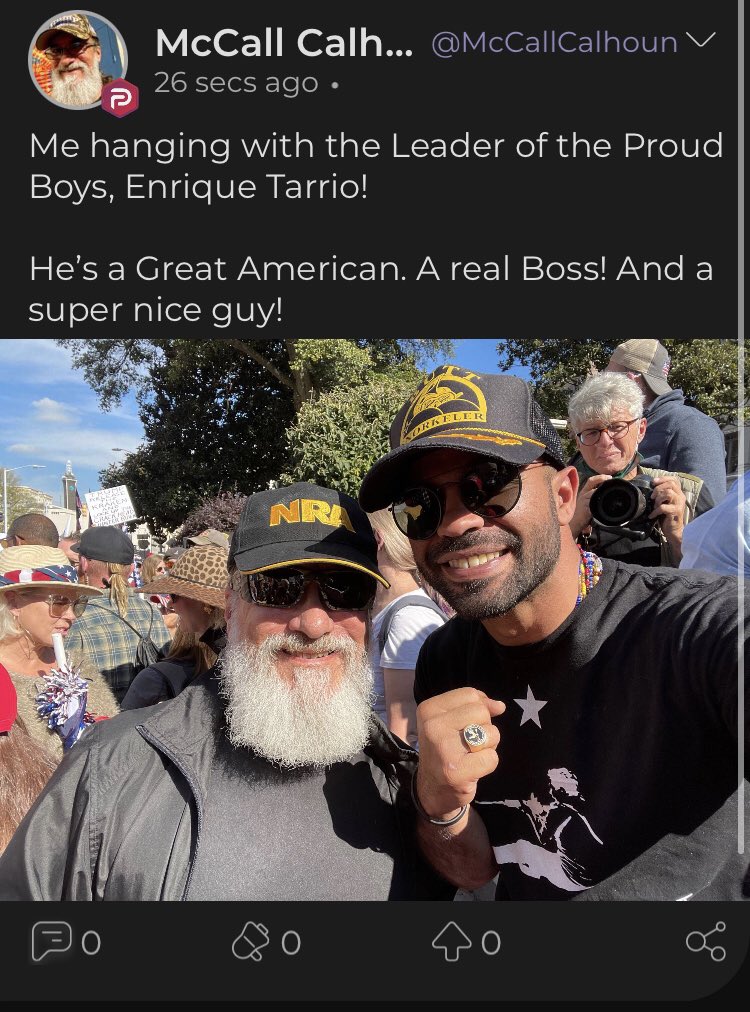 McCall Calhoun of Americus, Ga happily posing with the Proud Boys leader.