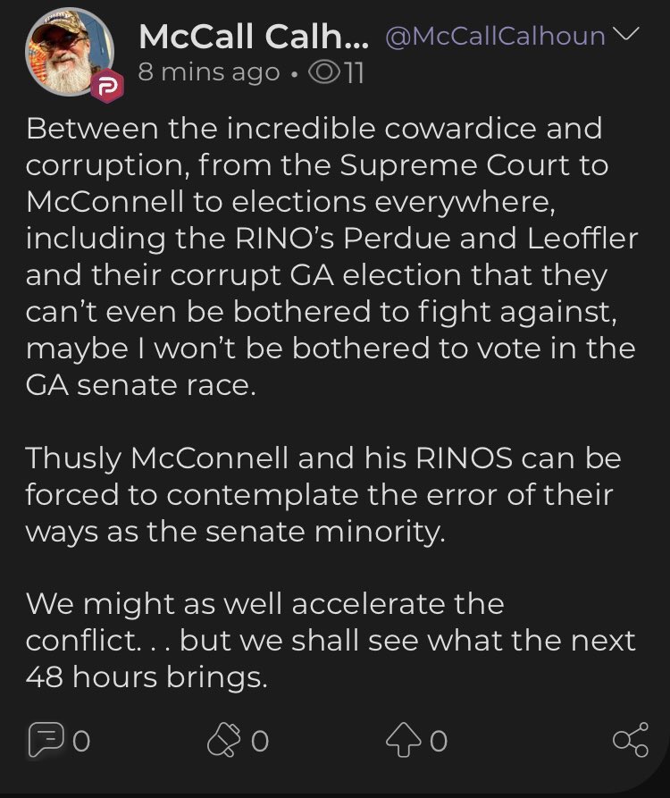 McCall Calhoun of Americus, Ga happily posing with the Proud Boys leader.