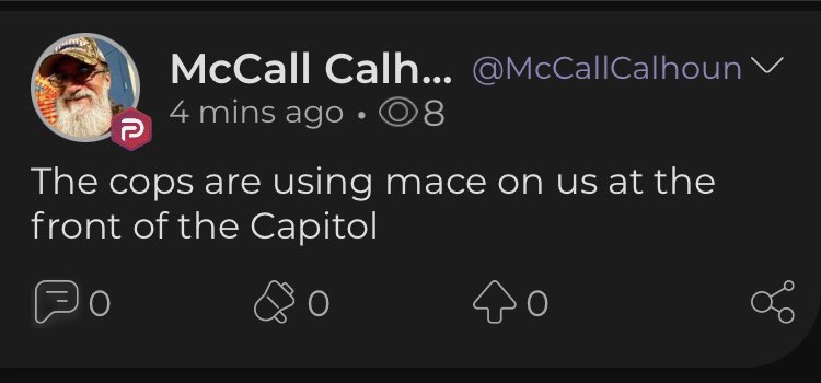 McCall Calhoun of Americus, Ga happily posing with the Proud Boys leader.