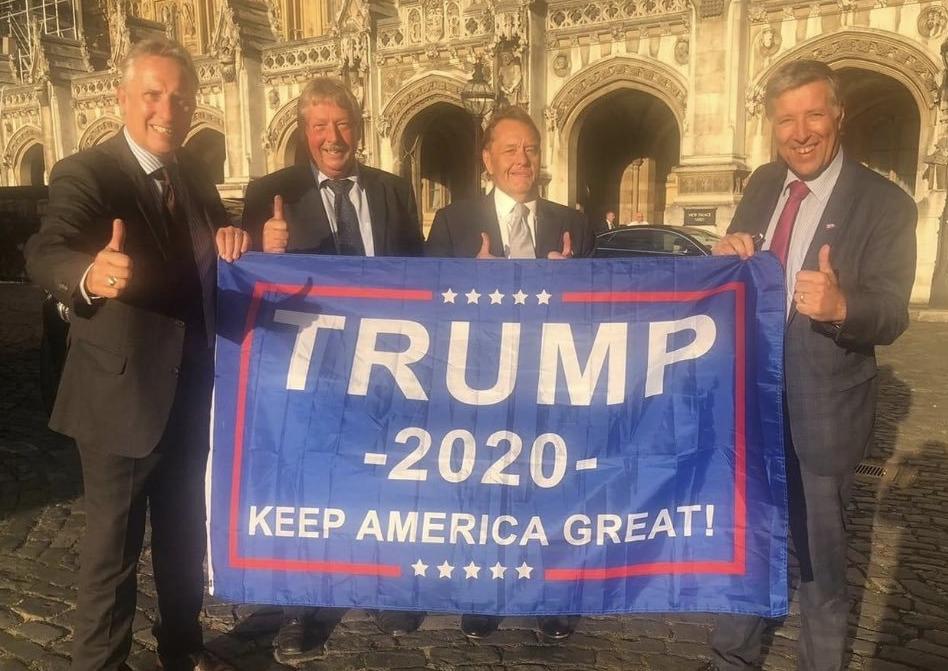 kitwizard's tweet photo. @Bonn1eGreer DUP MPs, Ian Paisley, Sammy Wilson, waving the flag. They love a flag. https://t.co/i1Ddkwmmvo