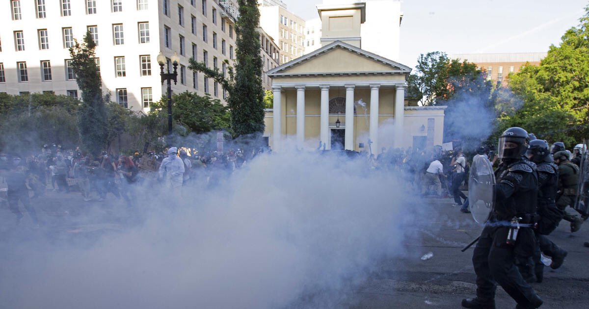 Photo of Black Lives Matter protests this past summer (2020), police are shown using tear gas on peaceful protesters.