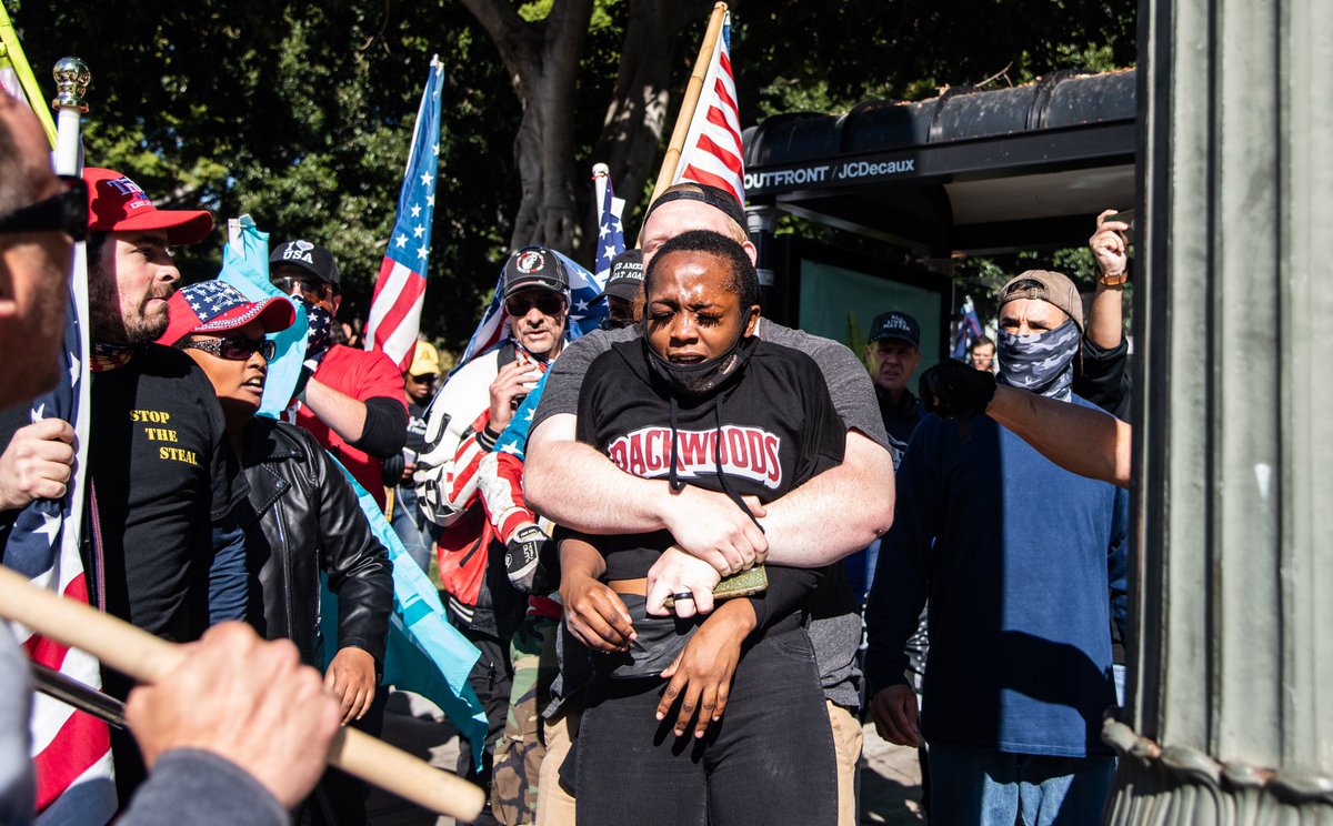 still_sexellent's tweet photo. Yesterday, Trump supporters attempted to lynch 25 year old Berlinda Nibo in LA. They RIPPED HER WIG OFF HER HEAD, surrounded her, and maced her. This was an attempted lynching. #BerlindaNibo needs to be trending. https://t.co/oFcvnmuKMr