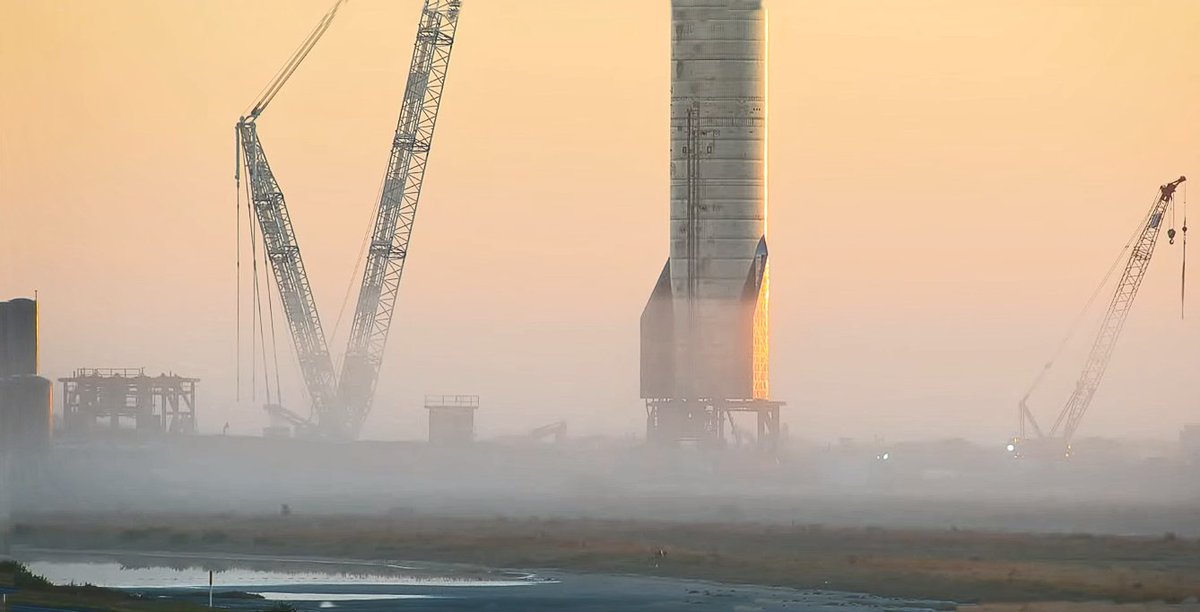 CowboyDanPaasch's tweet photo. appears test vessel nine's flight has slipped a wee bit. screencap from a few morns ago. #spacex #texas #labcam24/7 https://t.co/6RI8Qlsl6I