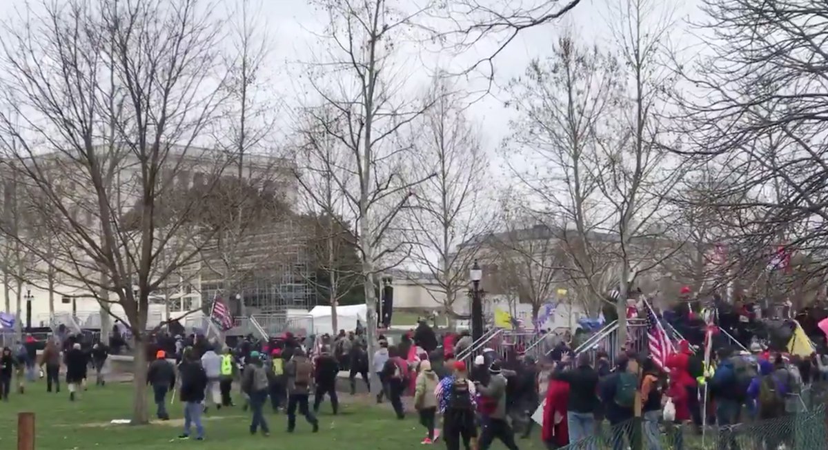 1:05PM EST: Hundreds of angry protesters start to charge towards the Capitol. House Speaker Pelosi gavels in a joint session to certify the 2020 election. President Trump is still speaking to supporters at The Ellipse. His speech will end around 1:10PM.