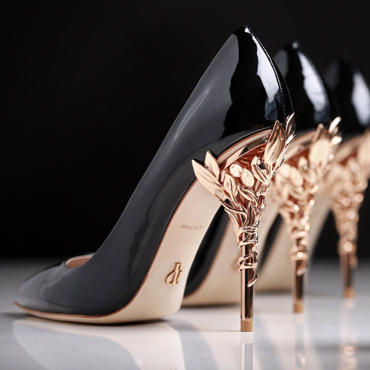 The embodiment of an icon - the Eden Heel by #RalphandRusso. Handcrafted in Italy, with ornamental filigree leaves spiralling up the heel, Find your unique match on ralphandrusso.com. #EdenHeel