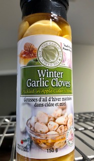GOING LOCAL:  Local garlic pickled in local organic apple cider and locally harvested honey.  A clove a day to keep the Dr. away.