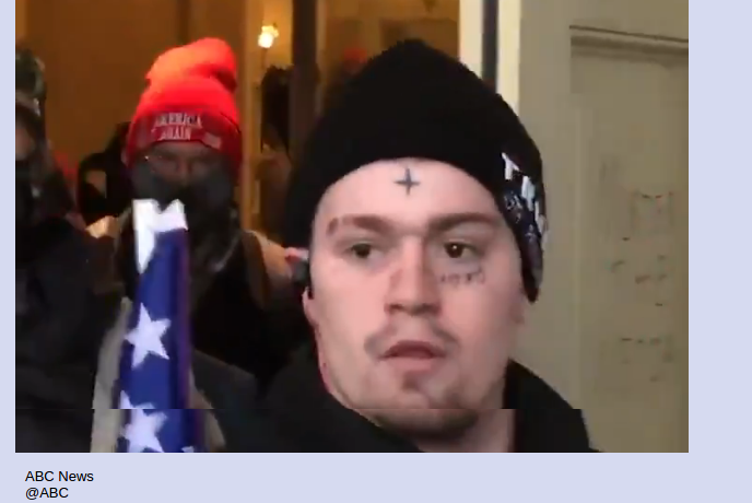 upside down cross?1 tear for each murder?Which part of Make America Great Again is this person championing?You will know them by their fruits.