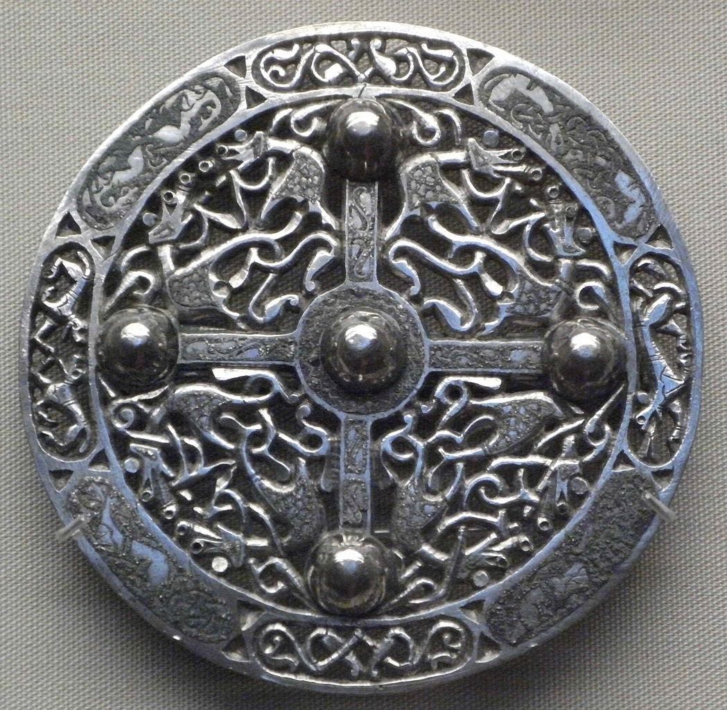 Another of the 9th-century Pentney Hoard silver disc brooches, decorated in the Trewhiddle style:  https://commons.m.wikimedia.org/wiki/File:Brit_Mus_17sept_004crop.jpg#mw-jump-to-license