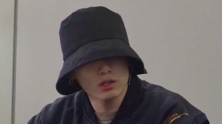 do you ever just think about how jungkook always wears bucket hats that gets too big for him so most of the time he has to look up or lift it just to see or show his face