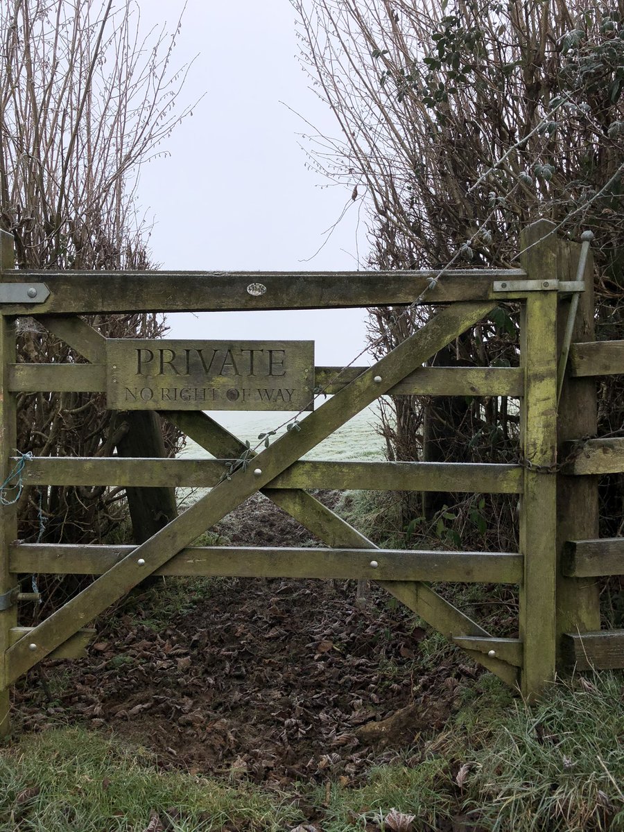 Shortcut across field to chained gate - but room to crawl underneath through frozen mud, having hidden in fog from 2 men and a vehicle who were burning cleared hedge stuff