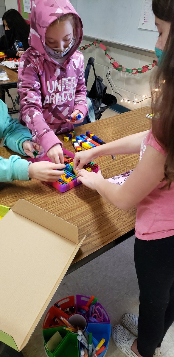 kristystepp's tweet photo. Finding the volume of objects in class with unifix cubes. They have to identify the length, width, and height and record it in their notebook. They did so good! #TeachHardLoveHarder @PeachCreekElem https://t.co/ukWDzjkpib
