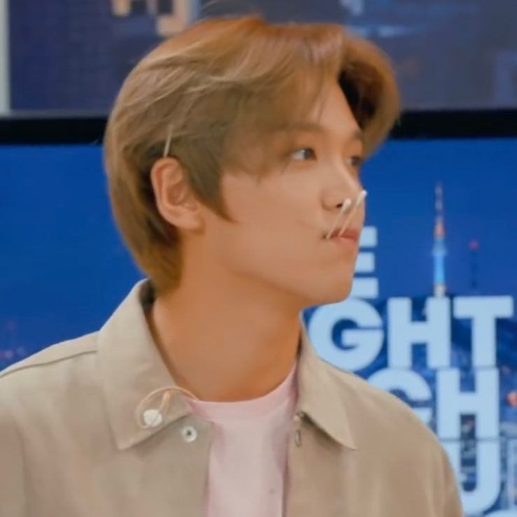 haechan with long hair ; a thread