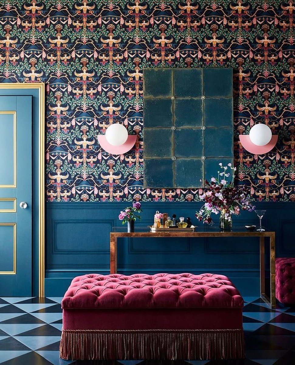 A joyful combination starring the buttoned stool in magenta velvet by <a href="/DavidSeyfriedUK/">David Seyfried Ltd</a> complemented by the silk bullion fringe by <a href="/Samuel_and_Sons/">Samuel & Sons</a> &amp; framed by a wall covering from the newest <a href="/HRP_palaces/">Historic Royal Palaces</a> collection from <a href="/Cole_And_Son/">Cole & Son</a> 
Credits: Adrian Briscoe &amp; Olivia Gregory