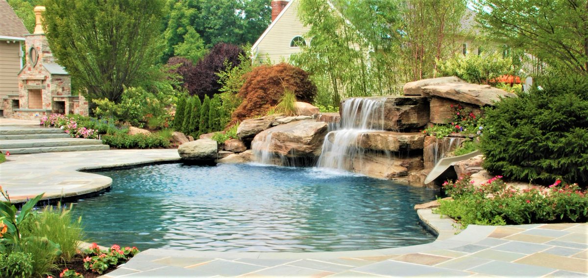 This #pool and #landscapedesign in #mahwahnj has us #dreaming of #summer2021! How about you?  #OneCallAway 201-785-0800 #staycation #naturelovers #lagoon #fireplace #swimmingpool #landscape #landscapelovers #OutdoorOasis #wedoitall #waterfalls #naturalstone #workofart