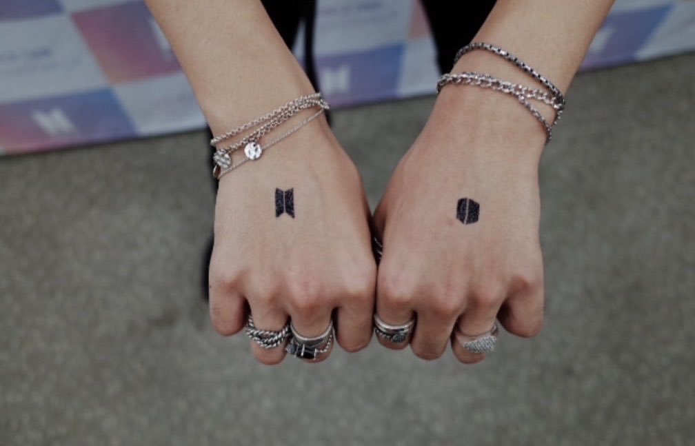 when he got bts and army henna tattoos.