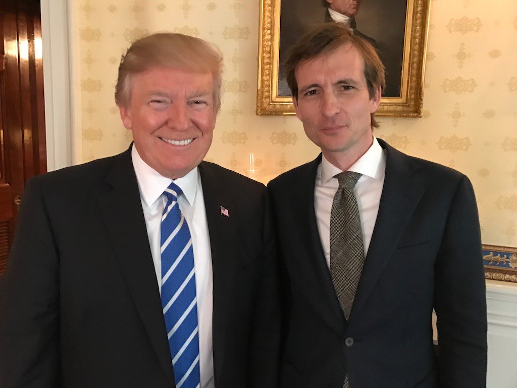 A journalist, Michiel Vos (who is also Nancy Pelosi’s son in law), appears in a picture with him on Wednesday. So? Michiel Vos, the same journalist, has his picture taken with a lot of people. Jake just wanted his picture taken.
