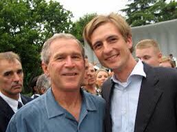 A journalist, Michiel Vos (who is also Nancy Pelosi’s son in law), appears in a picture with him on Wednesday. So? Michiel Vos, the same journalist, has his picture taken with a lot of people. Jake just wanted his picture taken.