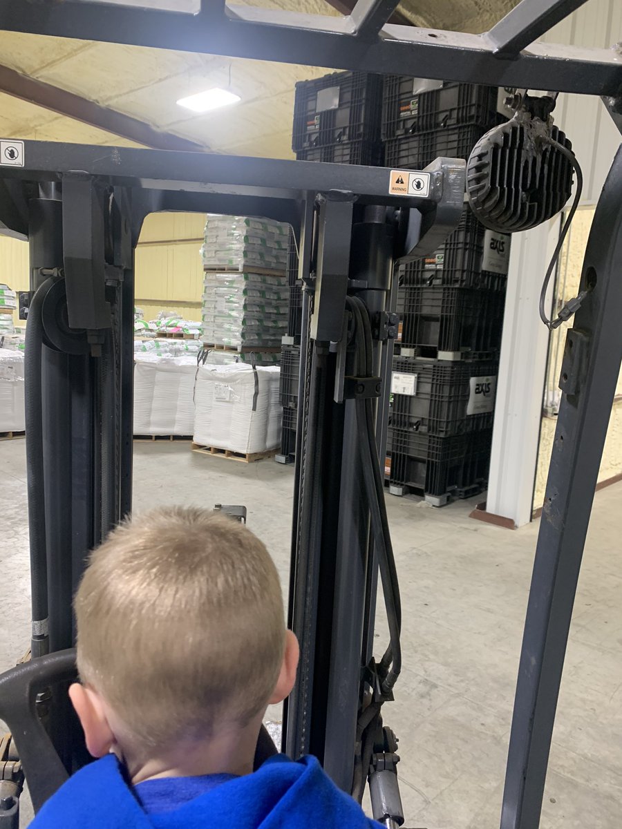 The next generation is doing some forklift driver training in the seed warehouse today. 🌽💪