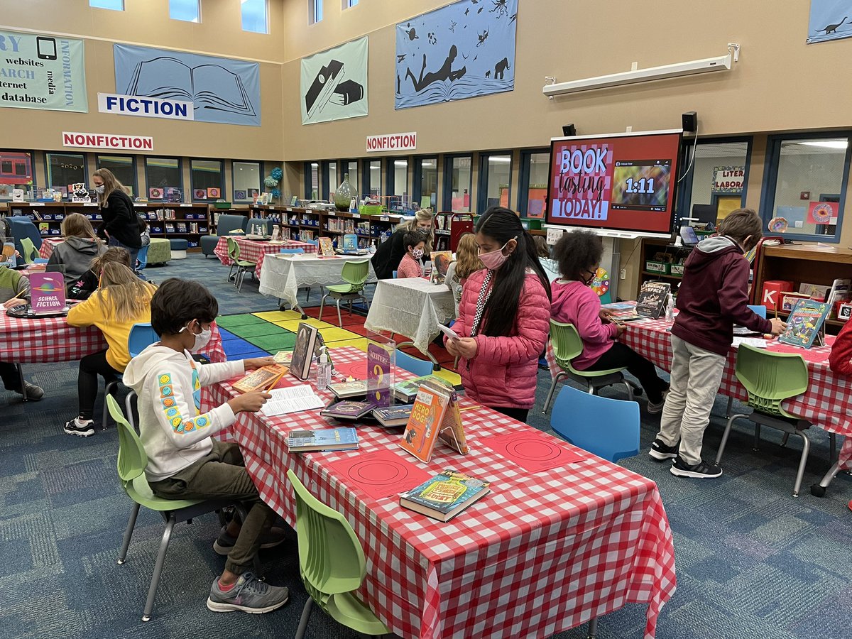 CedricSmithElem's tweet photo. Fourth graders explored different books and genres at today’s Book Tasting in the library.  They also completed Book Tasting menus.  Thank you, @SES_Librarian, for creating a love of reading in our kids! https://t.co/EWWdEHuNWv