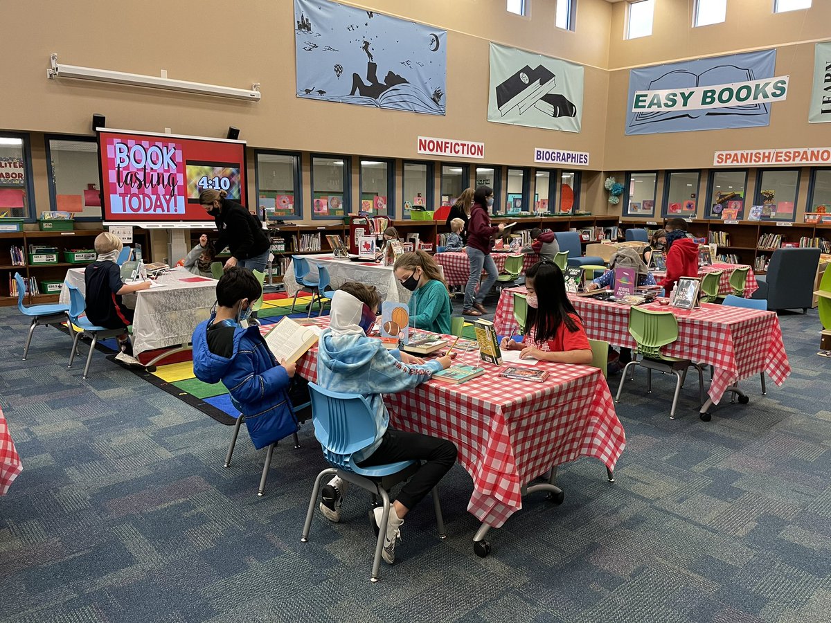 CedricSmithElem's tweet photo. Fourth graders explored different books and genres at today’s Book Tasting in the library.  They also completed Book Tasting menus.  Thank you, @SES_Librarian, for creating a love of reading in our kids! https://t.co/EWWdEHuNWv