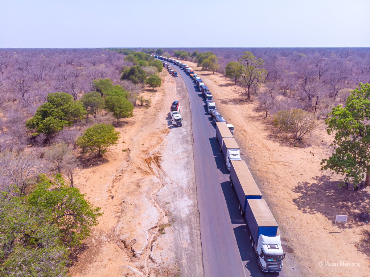 UnpluggedBW's tweet photo. Next time you think “my job is the worst,” consider these cross-border truck drivers, who traverse country to country to deliver goods for human sustenance, at times for low pay. Hopefully, with the #KazungulaBridge nearing completion, normality will prevail. #botswanaunplugged https://t.co/E4fCEZf7vB