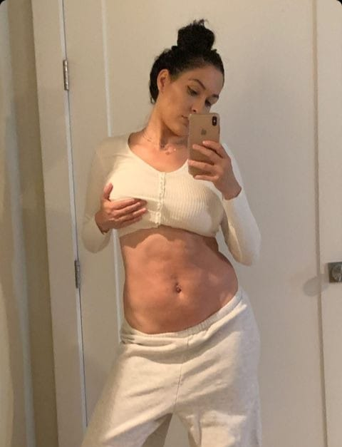 Fan21Grab's tweet photo. #NikkiBella grabbing a boob. https://t.co/5Is7gvkBbY