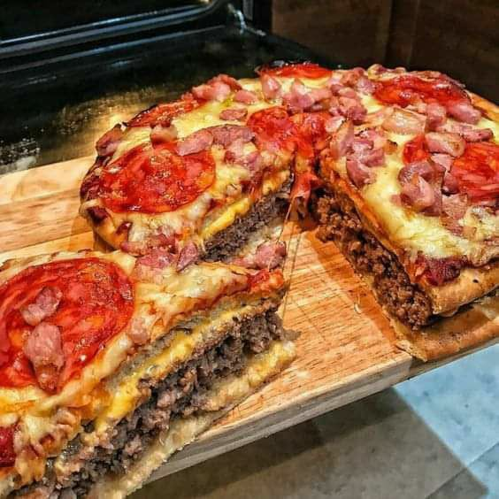 baitandwait's tweet photo. It's a pizza burger. Is this not the most glorious thing you've ever seen?  Bet this can be made on a Kamado Joe!
#grilling #pizza #kamadojoe #Burger #foodie #foodporn #hungry https://t.co/hLx1wWcGAB