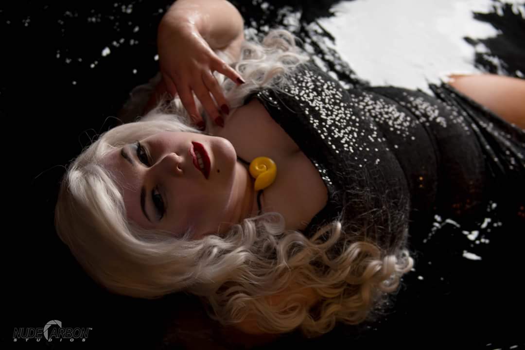 These categories are not completely without overlap! Here's a shot taken at a flattering angle to minimize face roundness, where my stomach is not only visible but highlighted nicely by the light reflecting off the sequins of the dress Nude Carbon Studios