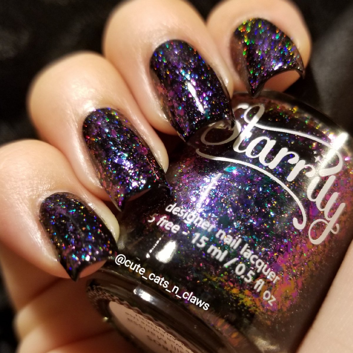CatsClaws2's tweet photo. My favorite nail polish of 2020! 😍

Thank you @kelli_marissa for making such an amazing polish!!

Holotaco- one coat black ×2
Starrily- Phobos x1
Holotaco- Glossy Taco https://t.co/7vUEiujxpG