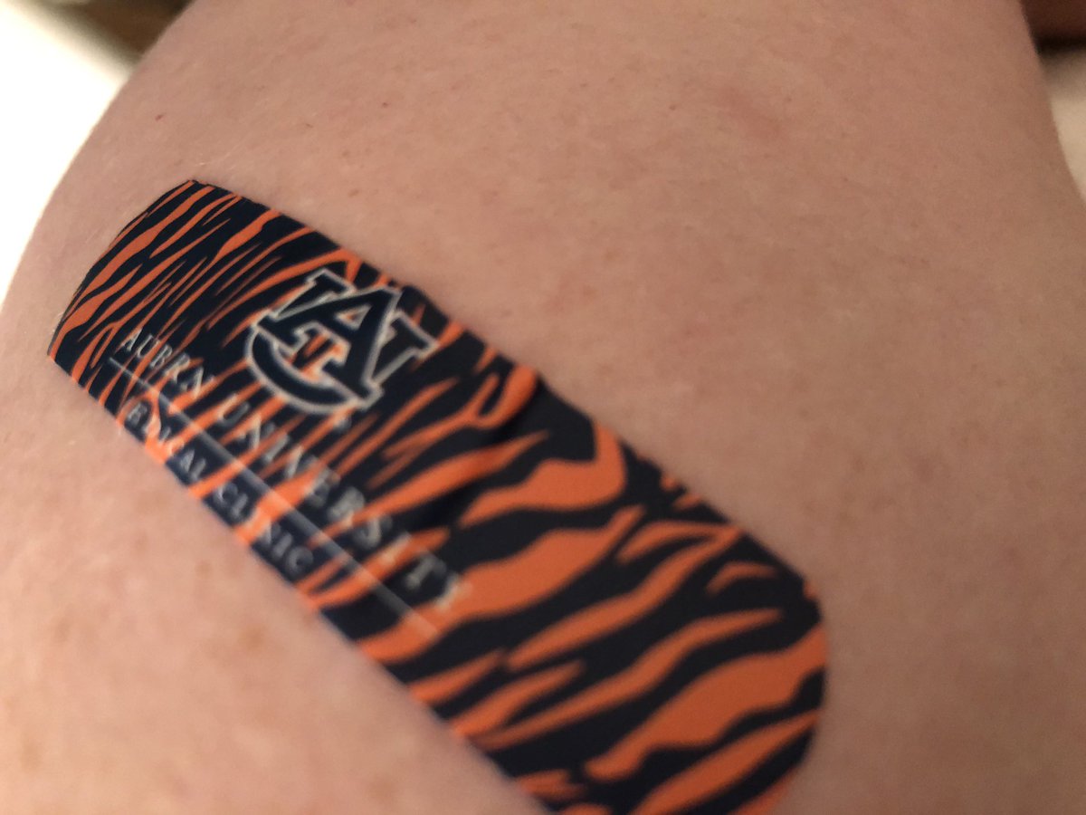 AUeagleTrainer's tweet photo. Shoutout to the @AUMedClinic for not only having the coolest band-aids, but also for all they’ve done for the Auburn community during all this! All the phone calls, COVID tests, and now vaccines they have done. And still dealing with all the other non COVID patients. #ThankYou https://t.co/mhC29fBsmU