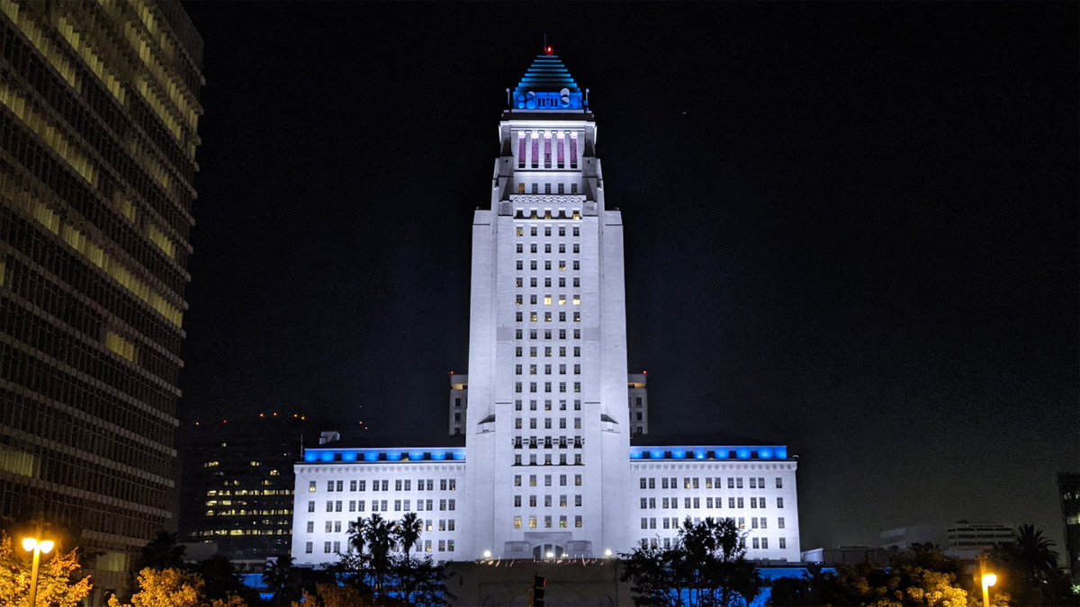 MayorOfLA's tweet photo. L.A. is mourning the loss of two remarkable ambassadors for our city, @Dodgers legend Tommy Lasorda and former L.A. City Councilmember Tom LaBonge.

We've lit City Hall in their honor as we remember them tonight. Rest in peace. https://t.co/VFx1s4ueSu