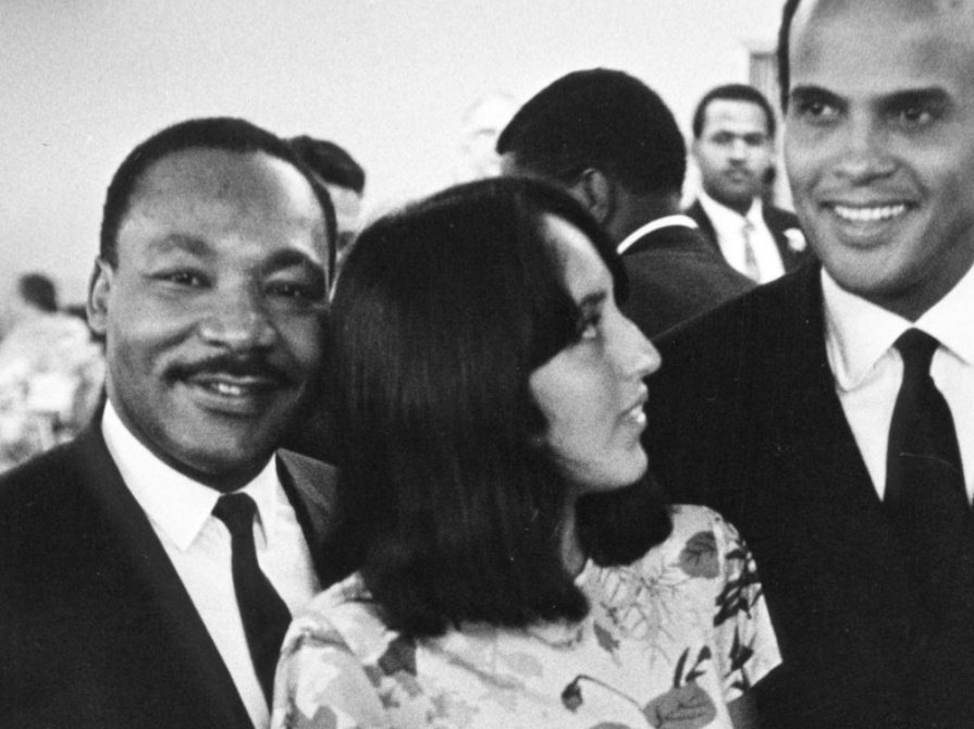 Joan Baez pictured marching with Martin Luther King on multiple occasions