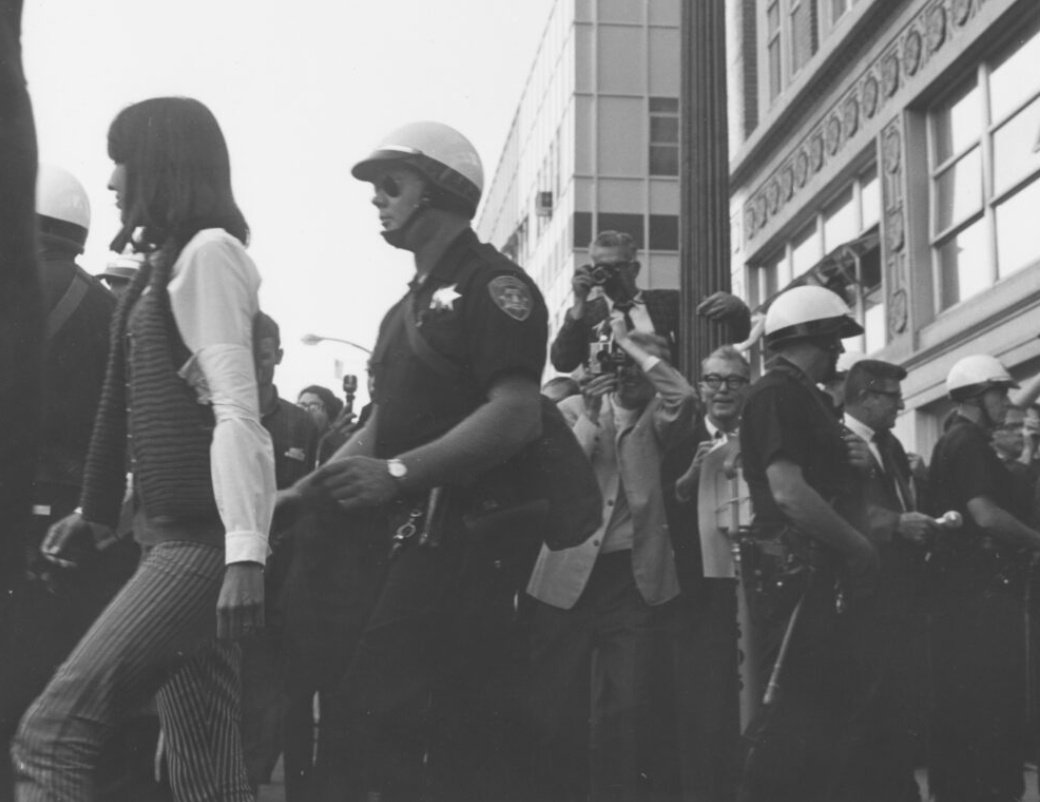 Joan Baez being arrested together with her mother for protesting the Vietnam War