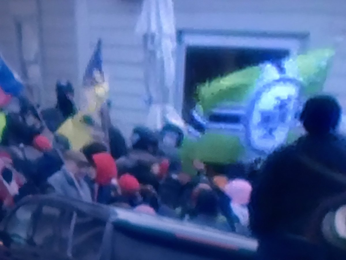 OnceYouGoJac's tweet photo. @tedcruz Your “supporters” were literally waving Nazi flags on the steps of the Capitol. If you don’t want to be called a Nazi than don’t associate with them. You are the company you keep. https://t.co/pWaVRiuF6j