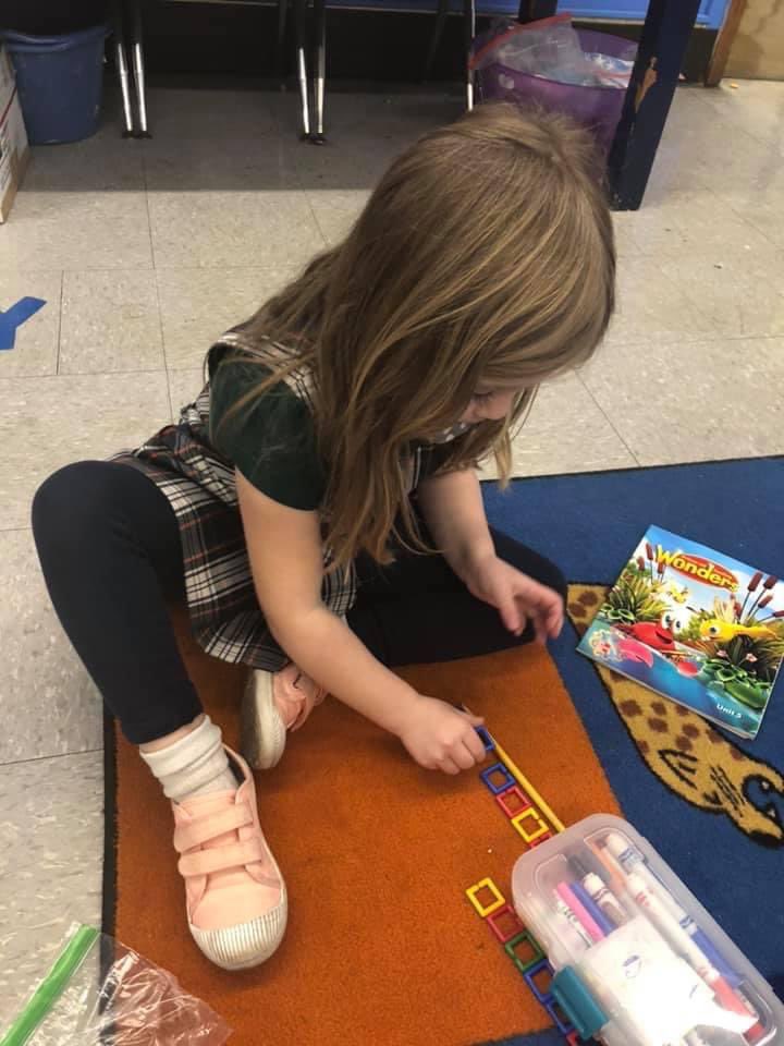 Strochschool's tweet photo. How do our St. Roch Kindergarten students “measure up?”  We are having a lot of fun starting our Math unit on measurement.  From brainstorming measurement words, to comparing and describing objects, to learning how to measure using links, there is no limit to learning. https://t.co/4DfMn0fmFZ
