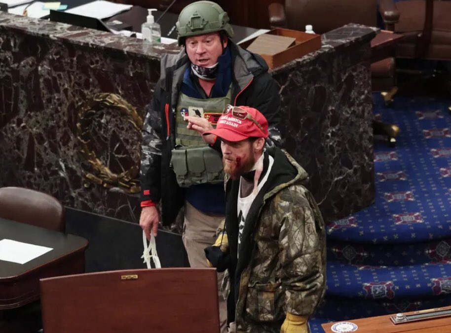 USAF Lt Colonel (retired) Larry Rendall Brock, Jr. from Dallas, TX, (call sign: Torch). One of two guys with flexcuffs. He was heavily decorated - 3 Meritorious Service Medals, 6 Air Medals & 3 Aerial Achievement Medals.He says he found the flexcuffs https://www.newyorker.com/news/news-desk/an-air-force-combat-veteran-breached-the-senate