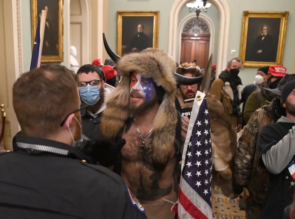 Jake Angeli (Q Shaman), a QAnon supporter who attends tons of Arizona right-wing rallies. FBI had trouble finding him.A funny side note - this manimal is who the far right are using as “proof” of antifa infiltration. https://www.azcentral.com/story/news/politics/arizona/2021/01/06/arizona-qanon-supporter-jake-angeli-joins-storming-u-s-capitol/6568513002/