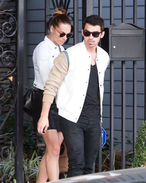 These were tough times in our and Joe’s life because it was when the Jonas Brothers band broke up. Joe was often spotted with what seemed to be a sad face, until one day picture 4 came out and we finally saw Joe’s smile again.